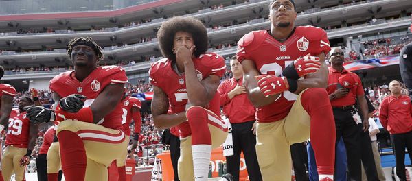 FILE - In this Oct. 2, 2016 file photo, from left, San Francisco 49ers outside linebacker Eli Harold, quarterback Colin Kaepernick and safety Eric Reid kneel during the national anthem before an NFL football game against the Dallas Cowboys in Santa Clara, Calif. In recent months, Colin Kaepernick has become comfortable with people knowing him as more than a laser-focused football player as he always previously preferred it. Perhaps, through the anthem protest and his emergence as an outspoken activist for minorities, Kaepernick has improved his image in the process. FILE - In this Oct. 2, 2016 file photo, from left, San Francisco 49ers outside linebacker Eli Harold, quarterback Colin Kaepernick and safety Eric Reid kneel during the national anthem before an NFL football game against the Dallas Cowboys in Santa Clara, Calif. In recent months, Colin Kaepernick has become comfortable with people knowing him as more than a laser-focused football player as he always previously preferred it. Perhaps, through the anthem protest and his emergence as an outspoken activist for minorities, Kaepernick has improved his image in the process. - Sputnik International