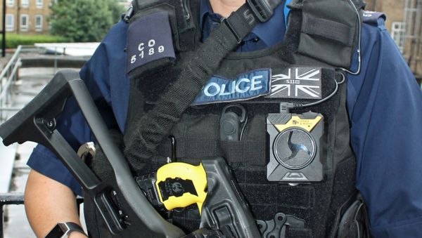 Armed police officer with body worn video - Sputnik International