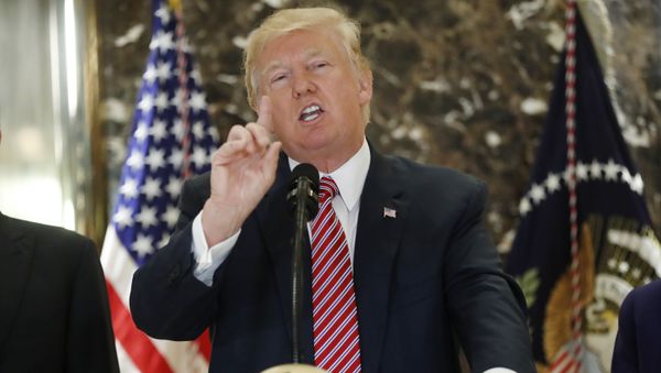President Donald Trump speaks to the media in the lobby of Trump Tower in New York, Tuesday, Aug. 15, 2017. - Sputnik International