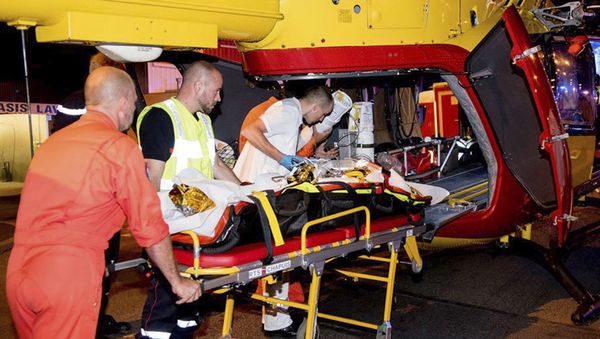 This photo provided Tuesday Aug. 15 2017 shows rescue workers evacuating a victim in a helicopter after a man deliberately rammed his car into a pizzeria in Sept-Sorts, east of Paris, Monday Aug. 14, 2017. - Sputnik International