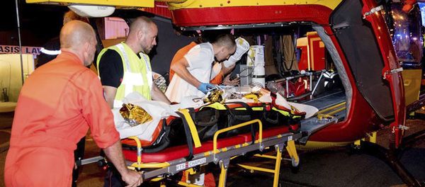 This photo provided Tuesday Aug. 15 2017 shows rescue workers evacuating a victim in a helicopter after a man deliberately rammed his car into a pizzeria in Sept-Sorts, east of Paris, Monday Aug. 14, 2017. - Sputnik International