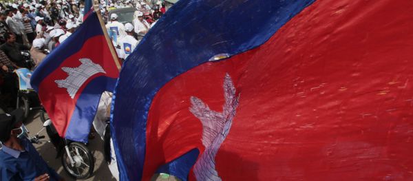 Cambodian National flags flutter over an opposition party supporters of the Cambodia National Rescue Party (CNRP) during the last day of campaigning ahead of communal elections, in Phnom Penh, Cambodia, Friday, June 2, 2017 - Sputnik International
