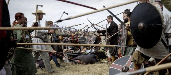 Around 200 people dressed as Vikings simulate a battle during the Viking Festival at Trelleborg, the Viking fortress of King Harald Bluetooth from around year 980 ad, near Slagelse, south-west of Copenhagen, on Friday July 17, 2015 Around 200 people dressed as Vikings simulate a battle during the Viking Festival at Trelleborg, the Viking fortress of King Harald Bluetooth from around year 980 ad, near Slagelse, south-west of Copenhagen, on Friday July 17, 2015 - Sputnik International