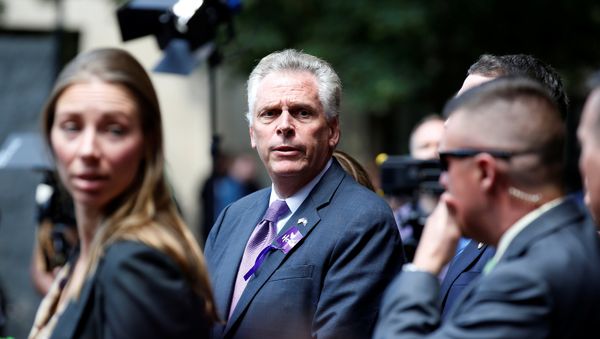 Virginia Governor Terry McAuliffe waits to make a statement after the memorial service for Heather Heyer, who was killed when a suspected white nationalist crashed his car into anti-racist demonstrators in Charlottesville, Virginia, U.S., August 16, 2017 - Sputnik International