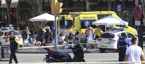 Injured people are treated in Barcelona, Spain, Thursday, Aug. 17, 2017 after a white van jumped the sidewalk in the historic Las Ramblas district, crashing into a summer crowd of residents and tourists and injuring several people, police said Injured people are treated in Barcelona, Spain, Thursday, Aug. 17, 2017 after a white van jumped the sidewalk in the historic Las Ramblas district, crashing into a summer crowd of residents and tourists and injuring several people, police said - Sputnik International