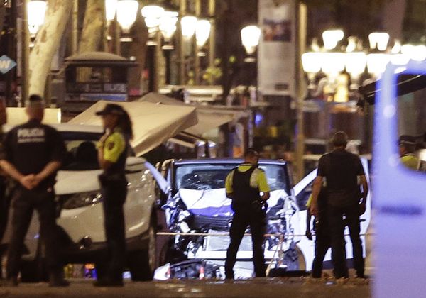 Police officers stand next to the van involved on an attack in Las Ramblas in Barcelona, Spain, Thursday, Aug. 17, 2017. Police officers stand next to the van involved on an attack in Las Ramblas in Barcelona, Spain, Thursday, Aug. 17, 2017. - Sputnik International