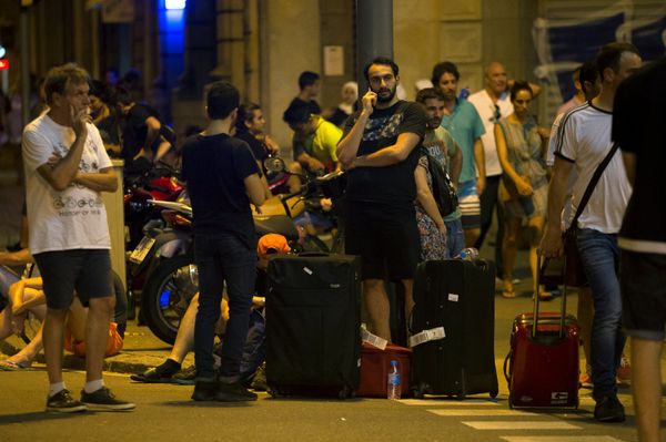 People wait to enter the area after a van crashed into pedestrians near the Las Ramblas avenue in central Barcelona, Spain August 17, 2017 People wait to enter the area after a van crashed into pedestrians near the Las Ramblas avenue in central Barcelona, Spain August 17, 2017 - Sputnik International
