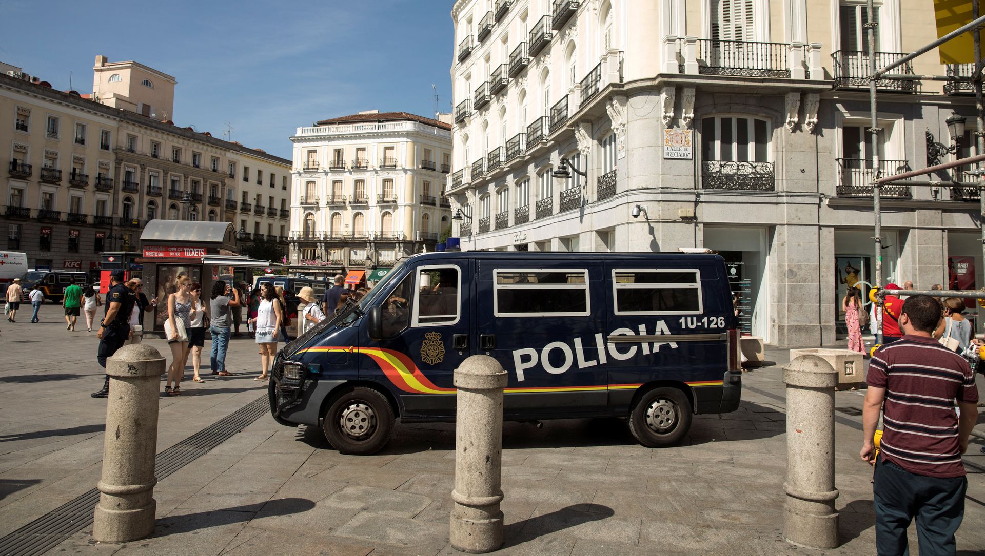 A police van drives by at Madrid's Puerta del Sol square, Spain, August 18, 2017 A police van drives by at Madrid's Puerta del Sol square, Spain, August 18, 2017 - Sputnik International, 1920, 22.06.2021
