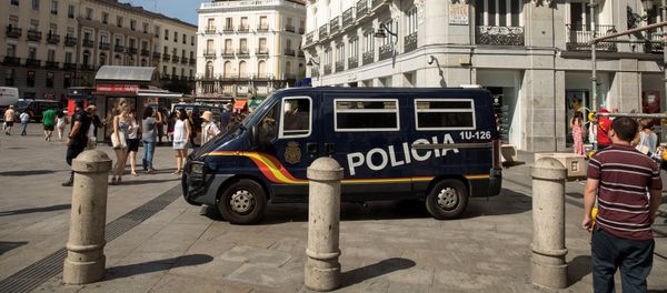 A police van drives by at Madrid's Puerta del Sol square, Spain, August 18, 2017 - Sputnik International