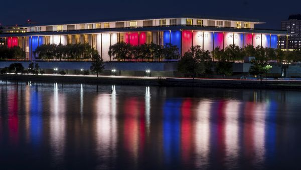 The red, white and blue lights, marking the 100th birthday of President John F. Kennedy, on the outside of the Kennedy Center for the Performing Arts are reflected in the Potomac River in Washington, Friday, May 26, 2017. The red, white and blue lights, marking the 100th birthday of President John F. Kennedy, on the outside of the Kennedy Center for the Performing Arts are reflected in the Potomac River in Washington, Friday, May 26, 2017. - Sputnik International
