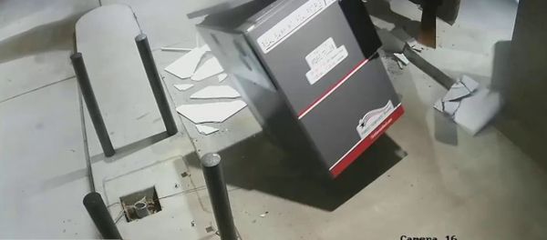 Screenshot of surveillance footage shows thieves using a forklift to steal an ATM in Arkansas. - Sputnik International