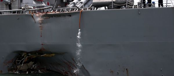 The U.S. Navy guided-missile destroyer USS John S. McCain is seen after a collision, in Singapore waters August 21, 2017. The U.S. Navy guided-missile destroyer USS John S. McCain is seen after a collision, in Singapore waters August 21, 2017. - Sputnik International