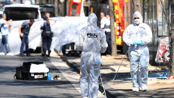 A white sheet is erected as a body of a victim is evacuated to a waiting ambulance while French forensic police officer search the site following a car crash on August 21, 2017, in the southern Mediterranean city of Marseille A white sheet is erected as a body of a victim is evacuated to a waiting ambulance while French forensic police officer search the site following a car crash on August 21, 2017, in the southern Mediterranean city of Marseille - Sputnik International
