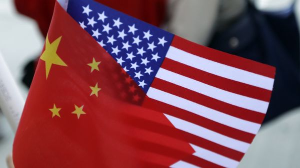 Chinese and US flags. (File) Chinese and US flags. (File) - Sputnik International