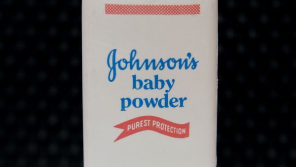 FILE - In this April 15, 2011, file photo, a bottle of Johnson's baby powder is displayed in San Francisco. A jury ruling on Thursday, May 4, 2017, in St. Louis, awarded Louis Slemp, a Virginia woman, a record-setting $110.5 million in the latest lawsuit alleging that using Johnson & Johnson's baby powder caused cancer. Slemp, who was diagnosed with ovarian cancer in 2012, blames her illness on her use of the company's talcum-containing products for more than 40 years. - Sputnik International
