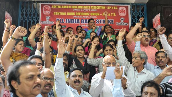 Indian bank employees representing the All India Bank employees Association (AIBEA) protest during a strike in Hyderabad Indian bank employees representing the All India Bank employees Association (AIBEA) protest during a strike in Hyderabad - Sputnik International