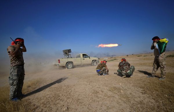 Shi'ite Popular Mobilization Forces (PMF) launch a rocket towards Islamic State militants on the outskirts of Tal Afar, Iraq, August 22, 2017 - Sputnik International