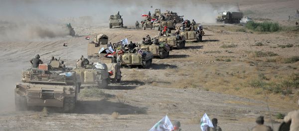 Shi'ite Popular Mobilization Forces (PMF) gather with Iraqi army on the outskirts of Tal Afar, Iraq, August 22, 2017 Shi'ite Popular Mobilization Forces (PMF) gather with Iraqi army on the outskirts of Tal Afar, Iraq, August 22, 2017 - Sputnik International