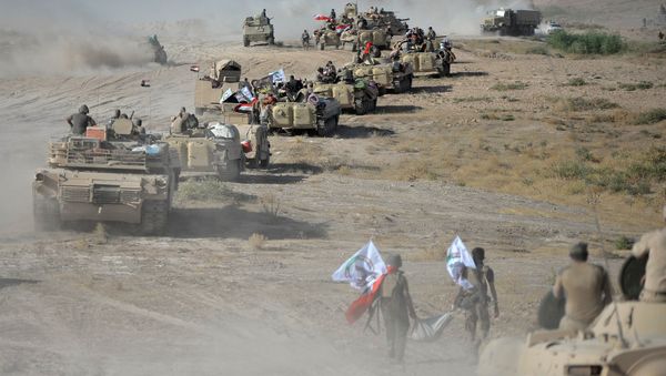 Shi'ite Popular Mobilization Forces (PMF) gather with Iraqi army on the outskirts of Tal Afar, Iraq, August 22, 2017 Shi'ite Popular Mobilization Forces (PMF) gather with Iraqi army on the outskirts of Tal Afar, Iraq, August 22, 2017 - Sputnik International
