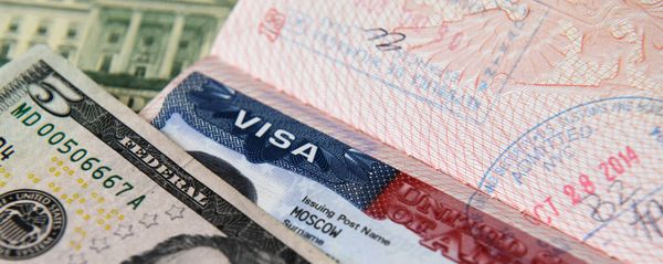 US dollar notes and an American visa US dollar notes and an American visa - Sputnik International