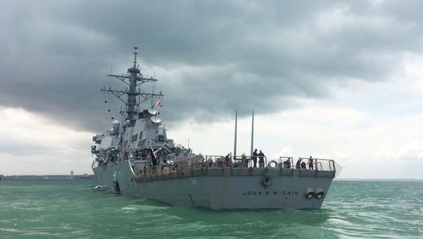 The U.S. Navy guided-missile destroyer USS John S. McCain is seen after a collision, in Singapore waters August 21, 2017 - Sputnik International