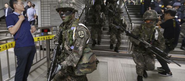 South Korean army soldiers conduct an anti-terror drill as part of Ulchi Freedom Guardian exercise inside a subway station in Seoul, South Korea, Tuesday, Aug. 22, 2017 South Korean army soldiers conduct an anti-terror drill as part of Ulchi Freedom Guardian exercise inside a subway station in Seoul, South Korea, Tuesday, Aug. 22, 2017 - Sputnik International