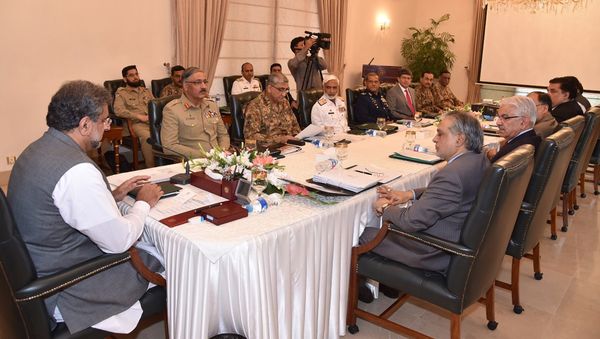 In this photo released by by Pakistan's Press Information Department, Prime Minister Shahid Khaqan Abbasi, left, heads a meeting of the National Security Committee in Islamabad, Pakistan, Thursday, Aug. 24, 2017 In this photo released by by Pakistan's Press Information Department, Prime Minister Shahid Khaqan Abbasi, left, heads a meeting of the National Security Committee in Islamabad, Pakistan, Thursday, Aug. 24, 2017 - Sputnik International