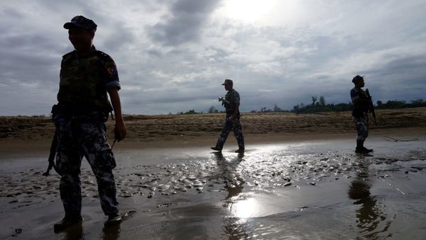 A Myanmar border guard police officers stand guard in Buthidaung, northern Rakhine state, Myanmar (File) - Sputnik International