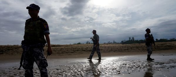 A Myanmar border guard police officers stand guard in Buthidaung, northern Rakhine state, Myanmar (File) A Myanmar border guard police officers stand guard in Buthidaung, northern Rakhine state, Myanmar (File) - Sputnik International