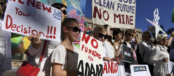 In this May 25, 2017 photo, environmental activists voice their opposition to Indian miner Adani's proposed Carmichael coal mine, outside Parliament House in Brisbane, Australia - Sputnik International