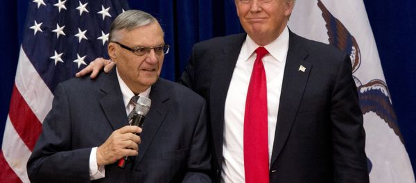 FILE - In this Jan. 26, 2016 file photo, then-Republican presidential candidate Donald Trump is joined by Joe Arpaio, the sheriff of metro Phoenix, at a campaign event in Marshalltown, Iowa. FILE - In this Jan. 26, 2016 file photo, then-Republican presidential candidate Donald Trump is joined by Joe Arpaio, the sheriff of metro Phoenix, at a campaign event in Marshalltown, Iowa. - Sputnik International