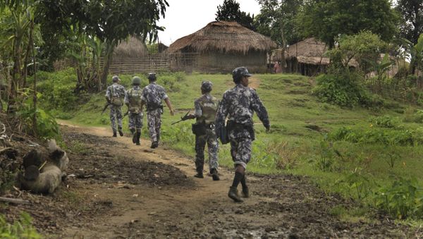 In this Friday, July 14, 2017 photo, Myanmar Border Guard Police (BGP) officers walk along a path ahead of journalists in Tin May village, in which Myanmar government and military claim the existence of Muslim terrorists in Buthidaung, Rakhine State, Myanmar. In this Friday, July 14, 2017 photo, Myanmar Border Guard Police (BGP) officers walk along a path ahead of journalists in Tin May village, in which Myanmar government and military claim the existence of Muslim terrorists in Buthidaung, Rakhine State, Myanmar. - Sputnik International