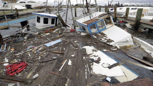 Boats that sunk in the wake of Hurricane Harvey are surrounded by floating debris Sunday, Aug. 27, 2017, in Rockport, Texas. Boats that sunk in the wake of Hurricane Harvey are surrounded by floating debris Sunday, Aug. 27, 2017, in Rockport, Texas. - Sputnik International