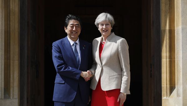 Britain's Prime Minister Theresa May (R) welcomes Japan's Prime Minister Shinzo Abe (L) at Chequers, the prime minister's official country residence, near Ellesborough, northwest of London, on April 28, 2017 Britain's Prime Minister Theresa May (R) welcomes Japan's Prime Minister Shinzo Abe (L) at Chequers, the prime minister's official country residence, near Ellesborough, northwest of London, on April 28, 2017 - Sputnik International