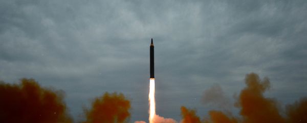 A missile is launched during a long and medium-range ballistic rocket launch drill in this undated photo released by North Korea's Korean Central News Agency (KCNA) in Pyongyang on August 30, 2017. A missile is launched during a long and medium-range ballistic rocket launch drill in this undated photo released by North Korea's Korean Central News Agency (KCNA) in Pyongyang on August 30, 2017. - Sputnik International