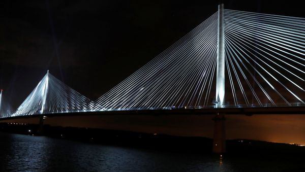 The Queensferry Crossing is illuminated to mark the ceremonial handover from the contractors to the Scottish Government, Queensferry, Scotland, Britain August 28 2017. - Sputnik International
