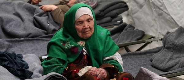 105-year old Afghan woman. Bibihal Uzbeki from Kunduz, Afghanistan, rests in Croatia's main refugee camp at Opatovac, Croatia, near the border with Serbia, Tuesday, Oct. 27, 2015 105-year old Afghan woman. Bibihal Uzbeki from Kunduz, Afghanistan, rests in Croatia's main refugee camp at Opatovac, Croatia, near the border with Serbia, Tuesday, Oct. 27, 2015 - Sputnik International
