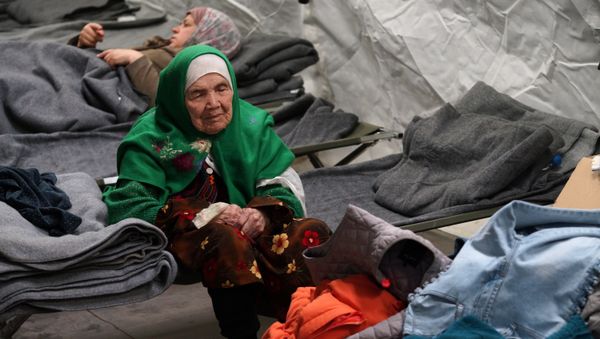 105-year old Afghan woman. Bibihal Uzbeki from Kunduz, Afghanistan, rests in Croatia's main refugee camp at Opatovac, Croatia, near the border with Serbia, Tuesday, Oct. 27, 2015 105-year old Afghan woman. Bibihal Uzbeki from Kunduz, Afghanistan, rests in Croatia's main refugee camp at Opatovac, Croatia, near the border with Serbia, Tuesday, Oct. 27, 2015 - Sputnik International