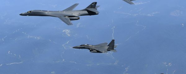 In this June 20, 2017 file photo provided by South Korean Defense Ministry, U.S. Air Force B-1B bombers, top, and second from top, and South Korean fighter jets F-15K fly over the Korean Peninsula, South Korea In this June 20, 2017 file photo provided by South Korean Defense Ministry, U.S. Air Force B-1B bombers, top, and second from top, and South Korean fighter jets F-15K fly over the Korean Peninsula, South Korea - Sputnik International