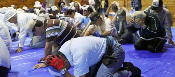 Local residents take part in an emergency drill in the wake of repeated missile launches by North Korea, in Takikawa on Japan's northernmost main island of Hokkaido, in this photo taken by Kyodo September 1, 2017 - Sputnik International