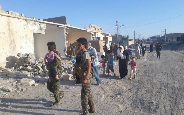 Refugees from Raqqa - Sputnik International