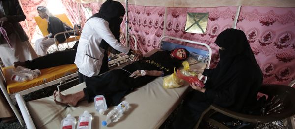 In this photo taken on Thursday, Jun 29, 2017, an elderly woman is treated for suspected cholera infection in a tent at a hospital in Sanaa, Yemen, Saturday, Jul. 1, 2017 - Sputnik International