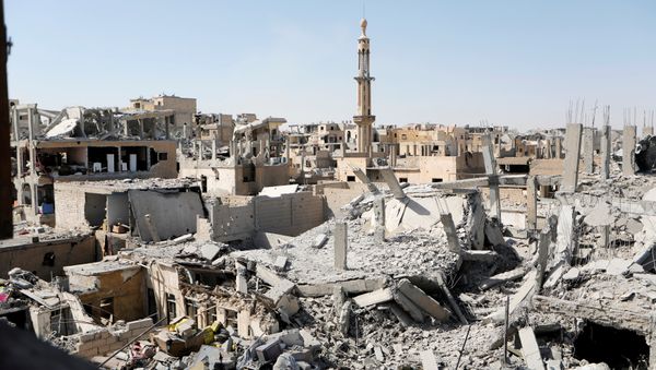 Damaged buildings are pictured during the fighting with Islamic State's fighters in the old city of Raqqa, Syria, August 19, 2017 Damaged buildings are pictured during the fighting with Islamic State's fighters in the old city of Raqqa, Syria, August 19, 2017 - Sputnik International