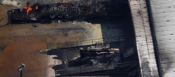 FILE PHOTO: A fire burns at the flooded plant of French chemical maker Arkema SA after Tropical Storm Harvey passed in Crosby, Texas, U.S. August 31, 2017. FILE PHOTO: A fire burns at the flooded plant of French chemical maker Arkema SA after Tropical Storm Harvey passed in Crosby, Texas, U.S. August 31, 2017. - Sputnik International