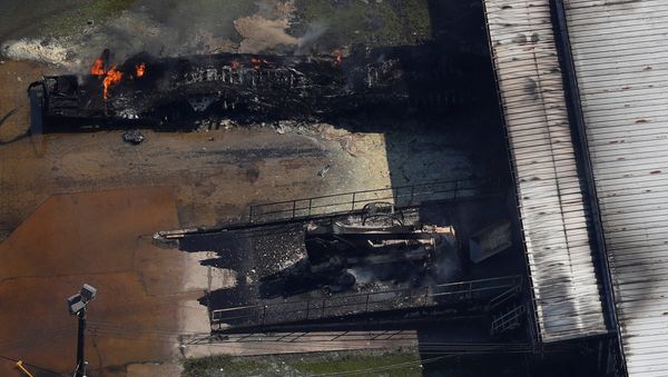 FILE PHOTO: A fire burns at the flooded plant of French chemical maker Arkema SA after Tropical Storm Harvey passed in Crosby, Texas, U.S. August 31, 2017. - Sputnik International