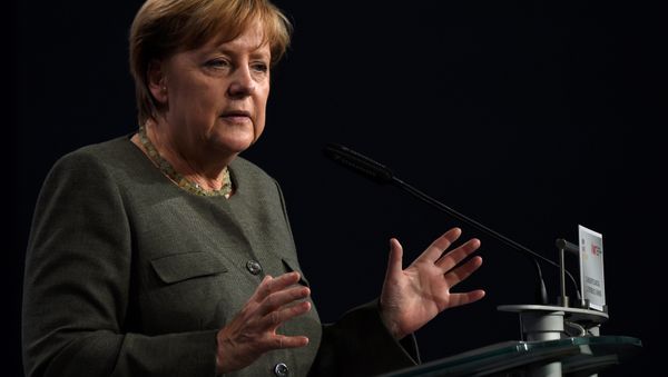 German Chancellor Angela Merkel gestures during her speech at the meeting of the Middle-size economy and economic union of the CDU/CSU in Nuremberg, southern Germany, on September 1, 2017 - Sputnik International