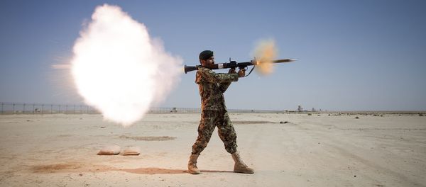 Afghan National Army soldier firing an RPG-7 Afghan National Army soldier firing an RPG-7 - Sputnik International