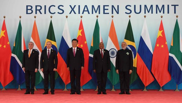 September 4, 2017. Russian President Vladimir Putin poses for a group photograph of the BRICS leaders. From right: Indian Prime Minister Narendra Modi, South African President Jacob Zuma and Chinese President Xi Jinping. Left: Brazilian President Michel Temer September 4, 2017. Russian President Vladimir Putin poses for a group photograph of the BRICS leaders. From right: Indian Prime Minister Narendra Modi, South African President Jacob Zuma and Chinese President Xi Jinping. Left: Brazilian President Michel Temer - Sputnik International