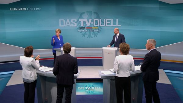 A screen that shows the TV debate between German Chancellor Angela Merkel of the Christian Democratic Union (CDU) and her challenger Germany's Social Democratic Party SPD candidate for chancellor Martin Schulz in Berlin, Germany, September 3, 2017.  - Sputnik International