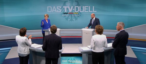A screen that shows the TV debate between German Chancellor Angela Merkel of the Christian Democratic Union (CDU) and her challenger Germany's Social Democratic Party SPD candidate for chancellor Martin Schulz in Berlin, Germany, September 3, 2017. - Sputnik International